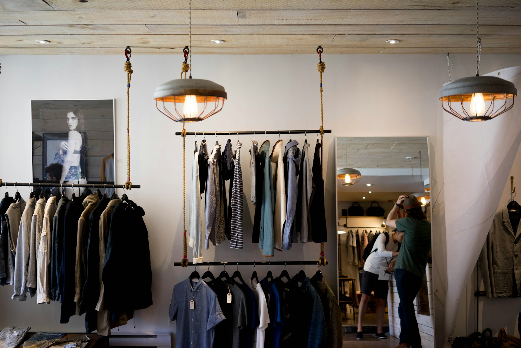 Customers shopping inside a bright retail store.